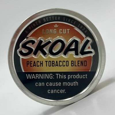 A Can of Skoal Peach Long Cut Dipping Tobacco